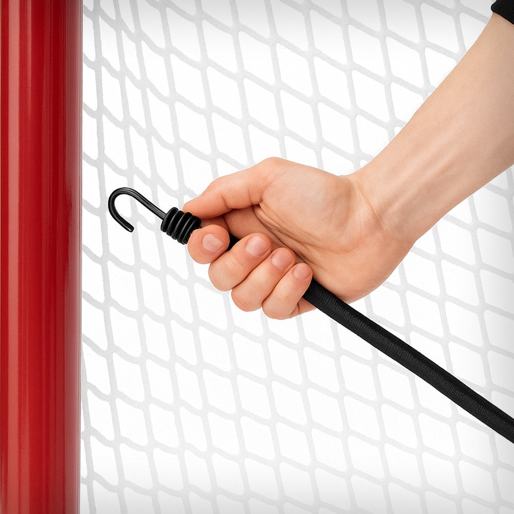 Target attached to a hockey goal with a bungee strap